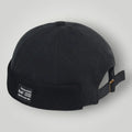 Bonnet homme Docker Mixte Noir Patch Texte Sangle Cuir