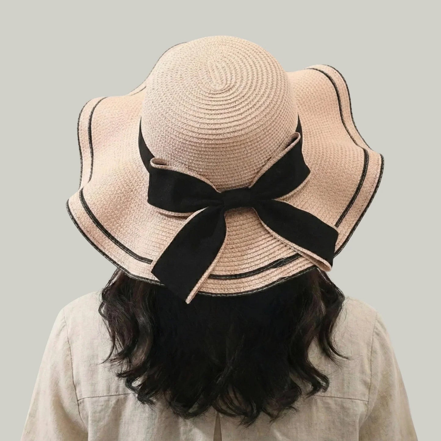 Chapeau de Paille Femme Rose Poudré – Nœud Noir Élégant